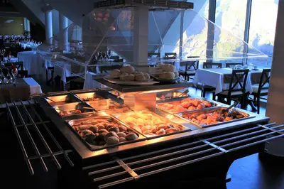 a buffet line with many different types of food at Eira do Serrado - Hotel & Spa in Curral das Freiras