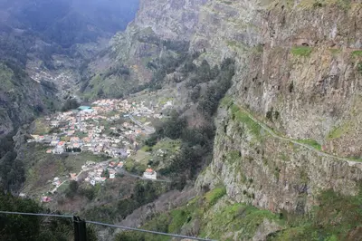 a view of a village in a mountain valley at Eira do Serrado - Hotel & Spa in Curral das Freiras