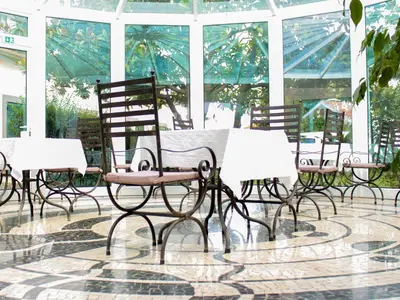a group of chairs and a table in a room at Solar de Boaventura in Boaventura