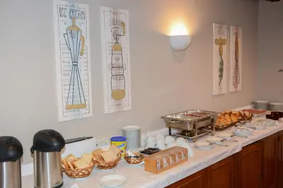 a buffet line with plates and bowls of food at Solar de Boaventura in Boaventura