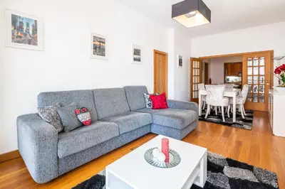 a living room with a couch and a table at Miramar Apartment with pool by Holiday Rental Madeira in Funchal