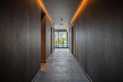 a corridor of a hallway with a hallway at Hotel Girassol - Suite Hotel in Funchal