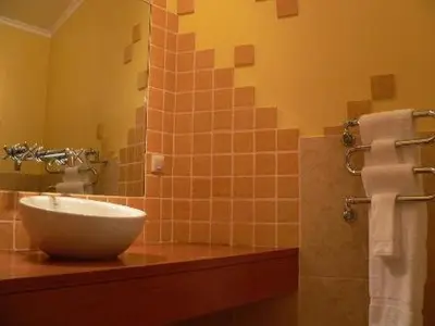 a bathroom with a sink and a shower at Colina Da Faja in Fajã da Ovelha