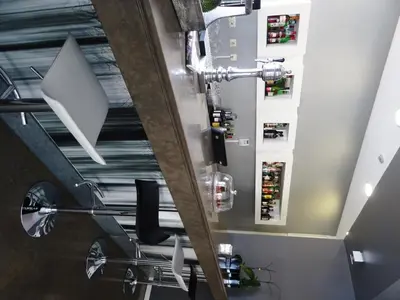 an overhead view of a barber shop with a chair at Madeira Bright Star by Petit Hotels in Funchal
