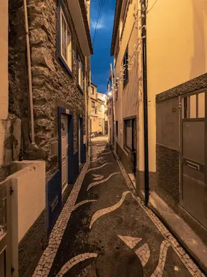 an alley in an old town at night at Apartment Blue Sea in Paul do Mar