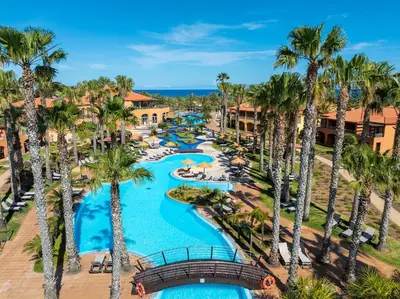 an aerial view of the pool at the resort at Pestana Porto Santo Premium All Inclusive Beach & SPA Resort in Porto Santo