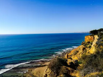 a view of the ocean from a cliff at Porto Mos Residence in Lagos