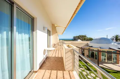a balcony with a view of the ocean at Pontalaia Apartamentos Turísticos in Sagres