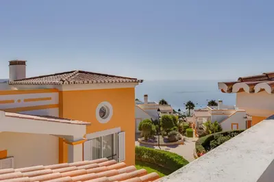 a view from the balcony of a house at The View – Santo António Villas, Golf & Spa in Salema