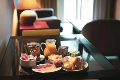 a tray of breakfast food on a table at Apartamentos Turisticos Atlantida in Funchal