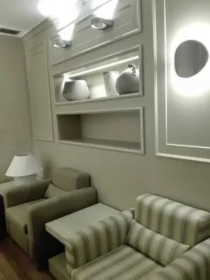 a living room with a couch and a table at Hotel Do Centro in Funchal