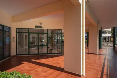 an empty lobby of a building with glass doors at Golden Star AU by An Island Apart in Funchal
