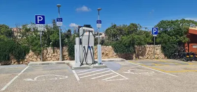 a parking lot with a gate in a parking lot at Belavista Da Luz - Wellness & Lifestyle Hotel in Luz