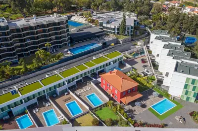an overhead view of a city with buildings and pools at Century House with private pool by Holiday Rental Madeira in Funchal