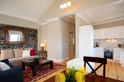 a living room with a couch and a table at The Docks in Paul do Mar