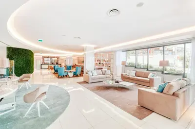 a large living room with couches and a table at Vila Baleira Funchal in Funchal