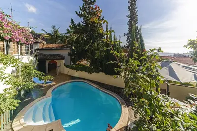 an overhead view of a swimming pool in a yard at Quinta Florença - By WeHost in Funchal