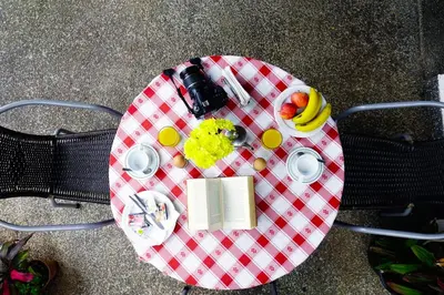 a table with a plate of food on top of it at Hotel GORDON in Funchal