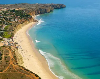 an aerial view of a beach and the ocean at Magnoliamar 409 in Lagos