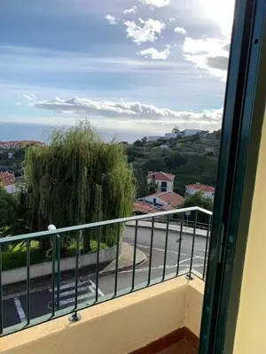 a balcony with a view of a street at Ilha Atlântico in Caniço
