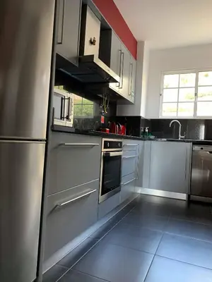a kitchen with stainless steel appliances at Ilha Atlântico in Caniço