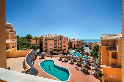 an aerial view of a resort with a swimming pool at Apartamento Boa Estrela in Luz