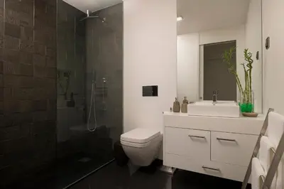 a bathroom with a toilet and a sink and a shower at Angel´s Paradise Luxury and Sophistication in Funchal