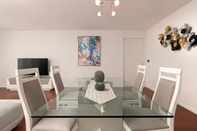 a glass dining room table with chairs and a cactus on it at Angel´s Paradise Luxury and Sophistication in Funchal