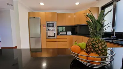 a bowl of fruit on a counter in a kitchen at Capela's House by LovelyStay in Ribeira Brava
