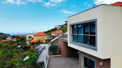 a view of a building from a balcony at Capela's House by LovelyStay in Ribeira Brava