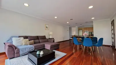 a living room with a couch and a table at Capela's House by LovelyStay in Ribeira Brava