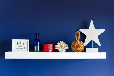 a white shelf with a star and other items on it at Sunny Getaway in Funchal in Funchal