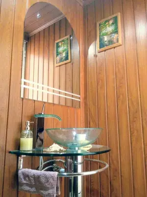 a bathroom with a sink and a mirror at Casa da Maria 15 - Funchal - Famílias in Funchal