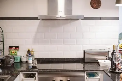 a kitchen with a sink and a counter top at The Waves Studios by Amazing Madeira in São Vicente