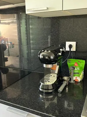 a coffee maker sitting on top of a counter at Cozy T2 with Ocean View in Funchal