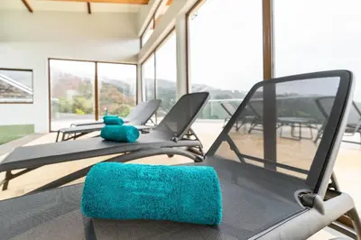 a group of treadmills sitting on a table in a gym at Rochão Village by Rent2U, Lda in Calheta