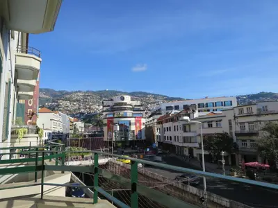 a view of a city from the balcony of a building at Market Downtown T3 in Funchal