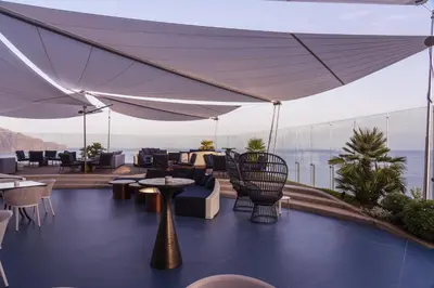 a restaurant with a view of the ocean at Savoy Palace - The Leading Hotels of the World - Savoy Signature in Funchal
