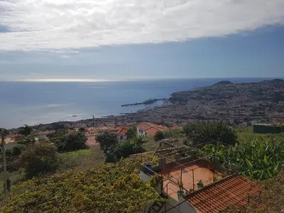 a view of the ocean from a house at City View Gardens II in Funchal