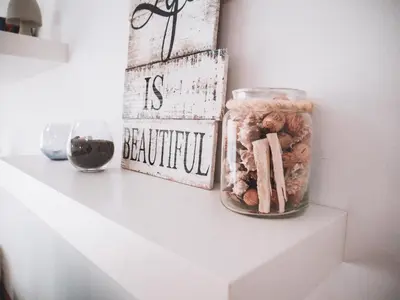 a jar of nuts sitting on a shelf with a sign at Formosa Infinity Pool Apartment in Funchal