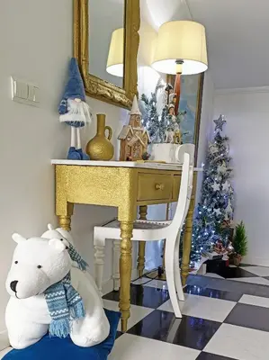 a gingerbread house and a christmas tree on a table at ATTIC BAY in Câmara de Lobos