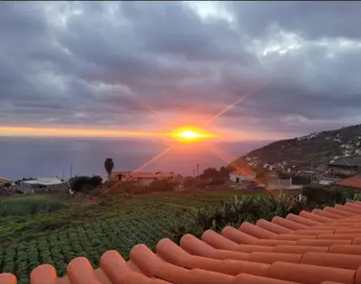 a view of the sunset from a baseball field at Villa Neto in Calheta