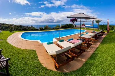 an open living room with a pool table at OurMadeira - Theo's House in Calheta