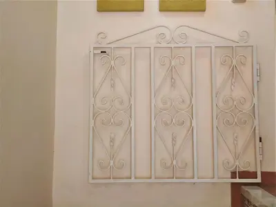 a gate on the side of a wall at Villa Luz Bay w Private Pool in Luz