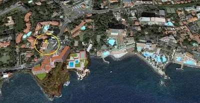 a map of a house next to the water at Quinta Miramar in Funchal