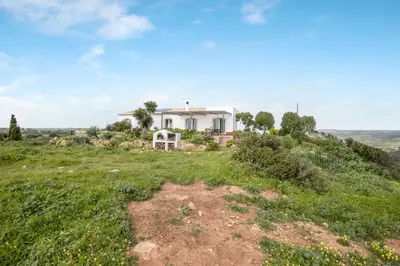an aerial view of a beach and the ocean at Casa das Furnas - Eco Home in Vila do Bispo