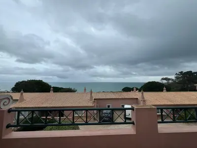 a view of the ocean from the balcony of a house at Dream Executive Apartments in Luz