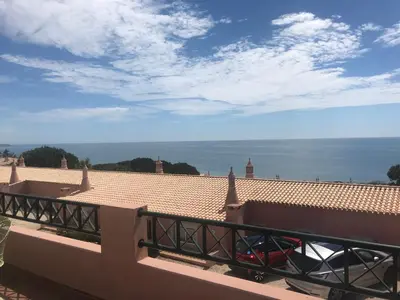 a view of the ocean from the roof of a building at Dream Executive Apartments in Luz