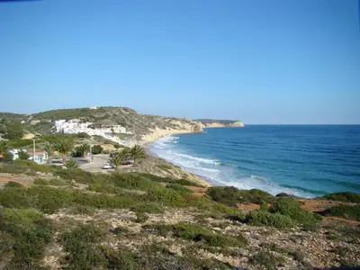 a view of a beach with the ocean at Casa Praia Mar in Salema