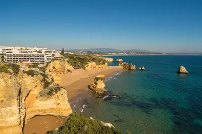 a view of a beach with rocks in the water at Vilita in Lagos